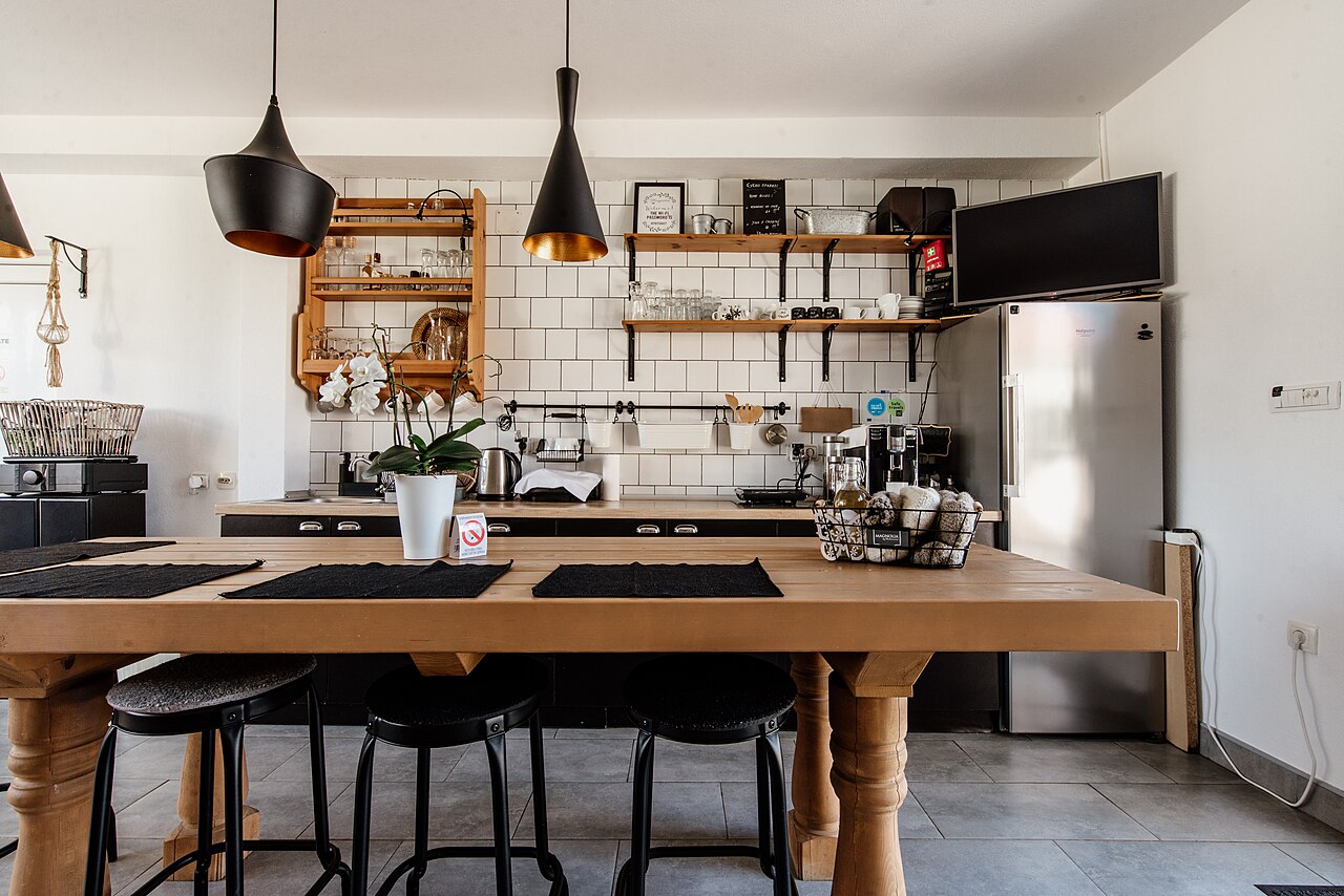 Bright kitchen with open shelves and neat dishware